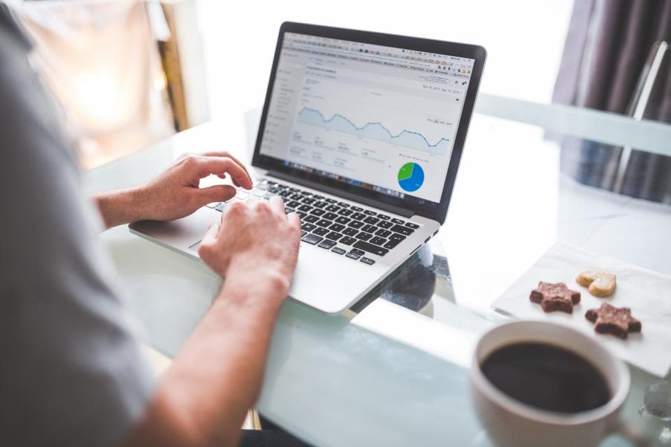 Search performance charts on a laptop screen